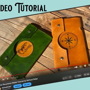 May include: A video tutorial demonstrating how to craft a leather wallet for vehicle documents. The wallet is crafted from brown and green leather and incorporates a compass design and a Jeep logo. The video is titled "Vehicle Documents Wallet Tutorial by Refined Pallet".