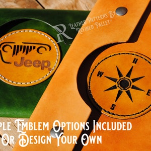 May include: Two leather wallets with different designs. The wallet on the left has a green leather exterior with a tan leather Jeep logo. The wallet on the right has a tan leather exterior with a tan leather compass design. The text "MULTIPLE EMBLEM OPTIONS INCLUDED OR DESIGN YOUR OWN" is printed on the wooden surface below the wallets.