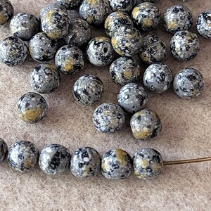 Black and grey speckled stone deals