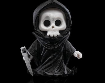 Grim Reaper figure / toy for children ages 4 and up / key ring, zipper pull, articulated figure and movable.