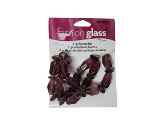 Fashion Glass purple faceted mix beads . 31 pieces