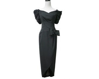 80s 90s off shoulder . long torso . overlap asymmetrical . black dress . fits like a small to medium  . made in USA