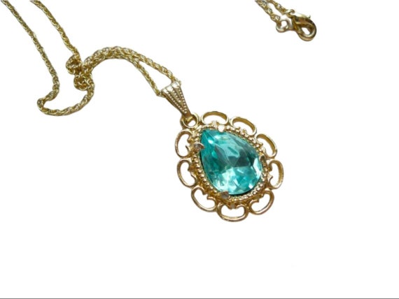 Blue green glass pendant and gold tone chain - image 1