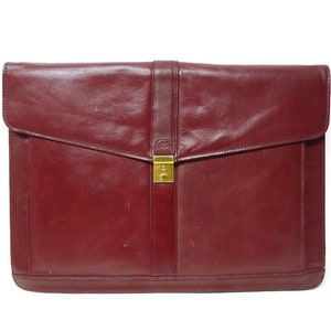 Cartera organizadora de cuero burdeos de los años 70