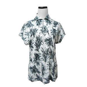 BLACK and WHITE . 1970s poly shirt . fits a medium to large