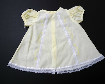 Kid's Closet . light yellow poly cotton . embroidered baby dress . size 0 - 3 months
