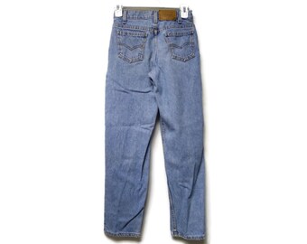 LEVI'S 550 . 80s orange tab . relaxed fit tapered leg . high waist . faded jeans . Student W26 L28 . made in USA