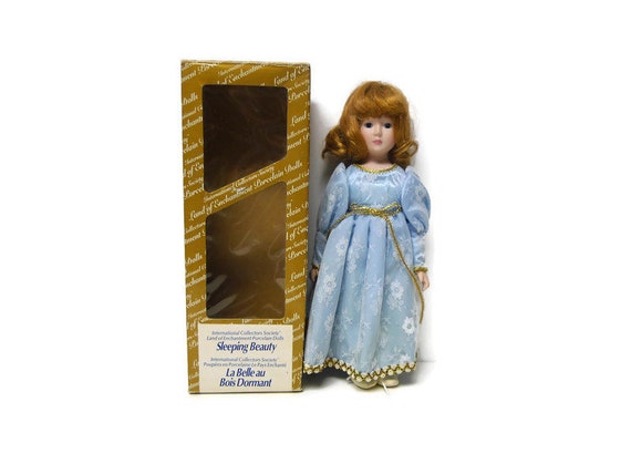 Sleeping beauty porcelain doll hotsell