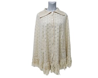 60s - 70s  knitted poncho sweater . size reg 32 - 40 .  Made in the Philippines
