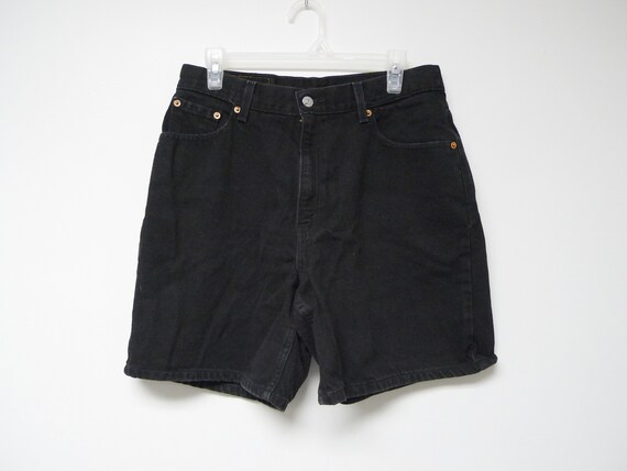 Levi's . 90s black denim shorts . regular 12