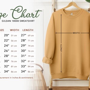 a size chart for a GILLET 1800 sweatshirt, with measurements for different sizes ranging from S to L. The chart also includes a diagram of the sweatshirt and a plant, providing a visual representation of the size and length measurements.