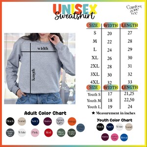 以下が含まれることがあります： ユニセックススウェットシャツのサイズ表で、大人と子供用のサイズがインチで表示されています。大人用と子供用のスウェットシャツの色チャートで、さまざまな色が表示されています。チャートには、黒、砂色、紺色、栗色、スポーツグレー、オレンジ、インディゴブルー、ヘザーダークグレー、白、ピンク、赤、ミリタリーグリーン、ヘザーフォレスト、セーフティピンクなどの色が含まれています。
