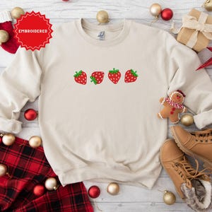 Embroidered Strawberry Design Sweatshirt - Cozy Beige Crewneck with Cute Red Berry Embroidery - Perfect Gift for Strawberry Lovers