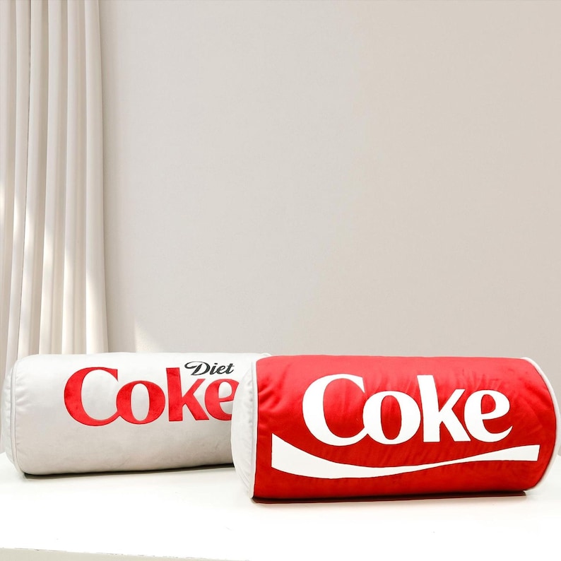 two soft drinks are sitting on a table
