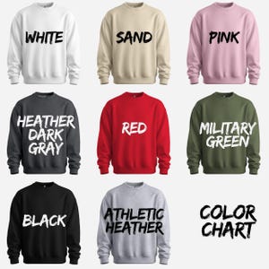 nine different sweatshirts, each with a unique color and design, arranged in a 3x3 grid.