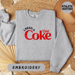 Embroidered I Need A Diet Coke Sweatshirt Comfort Colors Sand Crewneck Funny Soda Graphic Pullover Cozy Winter Outfit Beverage Gift