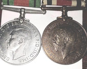 WW2-Verteidigungsmedaille und Special Constabulary Medal mit langen Dienststangen..Harold Riley