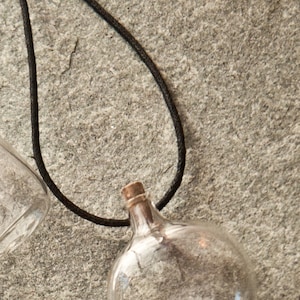 One Hand Blown Glass Bottle Pendant Hand Sculpted by Jenn Goodale