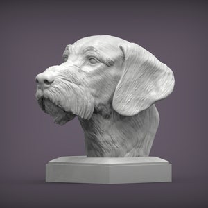 May include: A white ceramic sculpture of a dog's head. The dog has a long snout, floppy ears, and a textured coat. The sculpture is on a white pedestal.