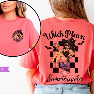 May include: Coral silk t-shirt featuring a witch graphic in a martini glass, with the text "Witch Please it's Summerween" on the back. The front has a smaller version of the graphic. The shirt is a short-sleeved, crew neck style.
