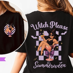 May include: Black t-shirt with a cartoon witch design in a martini glass, with the text "Witch Please" and "it's Summerween". The design includes bats, a checkered background, and a purple bow.