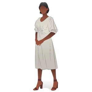 May include: A woman wearing a white dress with a gathered waist and brown heeled sandals.