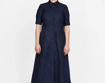 the assembly line shirt dress Our Shirt dress features a slight A-line silhouette and is designed to end at mid-calf length. Comes with a regular collar, a front button placket and two different cuff sleeves to choose