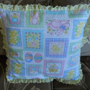 Easter pillow shams of rabbits, easter eggs in basket, easter eggs, chicks, chicks in egg, tulips, yellow flowers.
