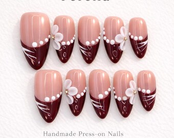 Ferena Elegant Brown French Tip Presse sur ongles avec fleur 3D | Ongles nude amande rose | Ensemble d'ongles de luxe fait main