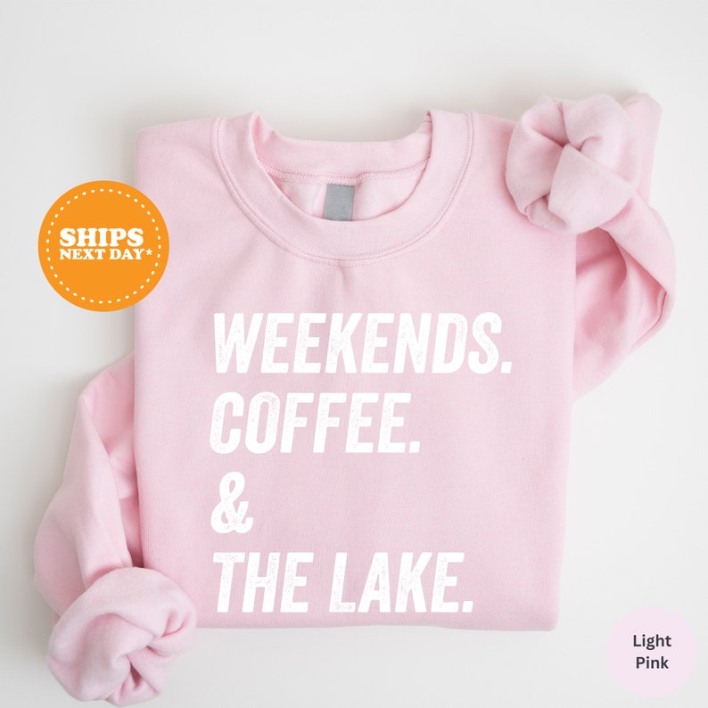 a pink sweatshirt with the words weekends, coffee and the lake on it