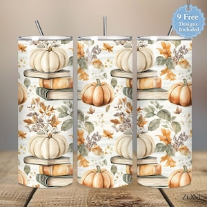 Puede incluir: Tres vasos de acero inoxidable con un diseño otoñal. Cada vaso presenta una calabaza blanca sobre una pila de libros, rodeada de hojas de otoño. El diseño incluye el texto "9 Free Designs Included".