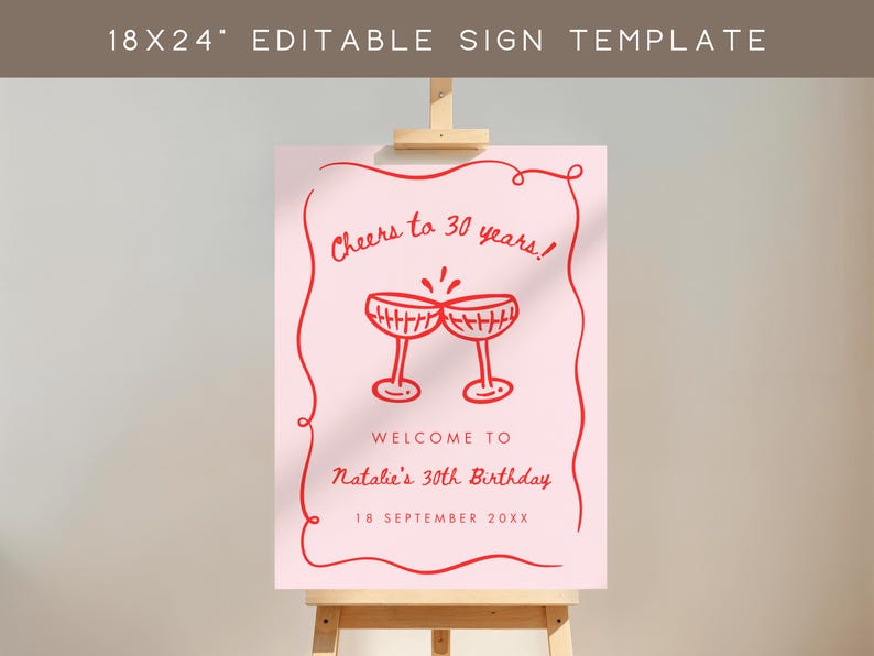 May include: A pink sign with red text and illustrations, displayed on a wooden easel. The sign reads "Cheers to 30 years!" and "Welcome to Natalie's 30th Birthday, 18 September 20XX." The sign is 18x24 inches.
