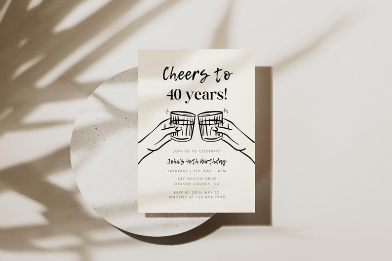 May include: A white invitation card with black text and a simple line drawing of two hands clinking glasses. The text reads "Cheers to 40 years!" and "Join us to celebrate John's 40th Birthday".