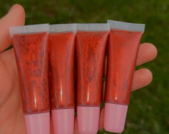 Lipgloss mit Erdbeer-Sonnenuntergang-Geschmack