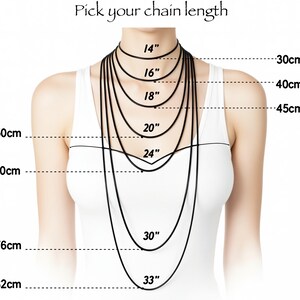 The image is a diagram that shows the size of a necklace in centimeters, ranging from 14 to 80 centimeters. It provides a visual representation of the chain length for different necklace sizes.