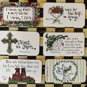 May include: Six rectangular cards with inspirational quotes and illustrations. One card has a floral border and the text "I thank my GOD every time I think of you." Other cards feature a cross, a swan, and a dove.