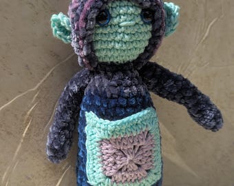 Criaturas de bolsillo de color arándano y lavanda que brillan en la oscuridad