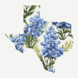 May include: A cross-stitch design of the state of Texas, filled with bluebonnet flowers and green leaves. The flowers are a vibrant blue, set against a white background. The design is detailed and captures the essence of Texas.