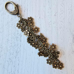 Bronze Plated Flower Bag Charm, Bee Spring Summer Purse Charm, Flower Tassel