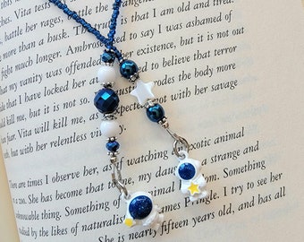 Whimsical Astronaut Charm Bookmark in Deep Blue and White