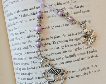 Handcrafted Beaded Bookmark featuring Unicorn Skeleton Charm - Quirky Literary Accessory