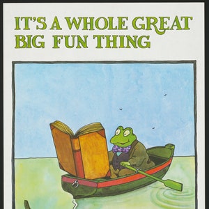 May include: A green frog wearing a bow tie sits in a boat and reads a large book. The boat is floating on a body of water with a green fish reading a smaller book in the water below.