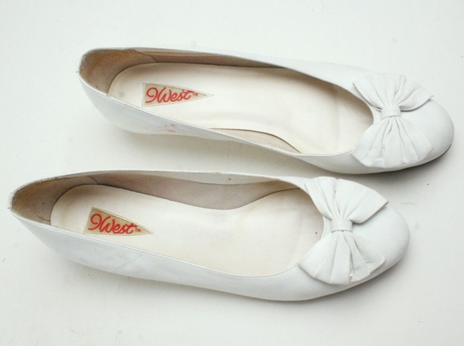 white patent leather ballet flats