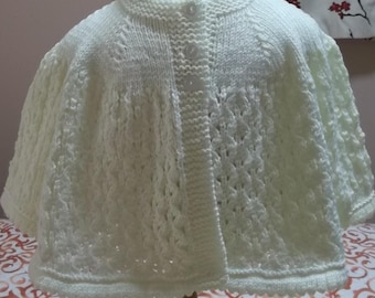 Manteau bébé tricoté à la main de style vintage