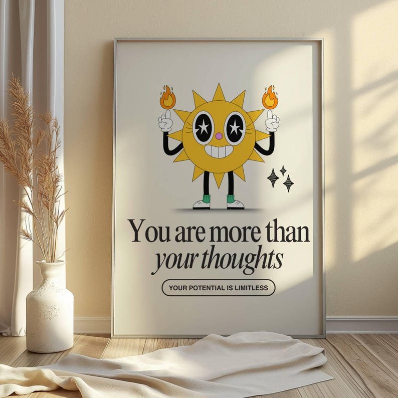 K&ouml;nnte beinhalten: Ein Motivationsposter mit einer Cartoon-Sonne, die zwei Flammen h&auml;lt. Der Text lautet "Du bist mehr als deine Gedanken" und "Dein Potenzial ist grenzenlos".
