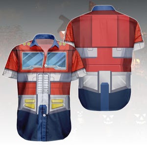May include: A short-sleeved button-down shirt featuring a red, blue, white, and yellow design inspired by a popular animated character. The shirt has a blue collar and a detailed graphic print on the front and back, resembling a robot's armor.