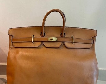 Beautiful Bag “Brown Travel Bag With Lock And Keys Hermes”