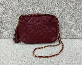 Travel Bag “Burgundy/Dark Red Caviar CC Tassle Medium Chanel Camera Bag”