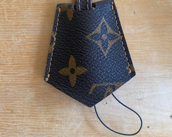 Louis Vuitton Key Bell Leather Strap in LV Logo Clochette