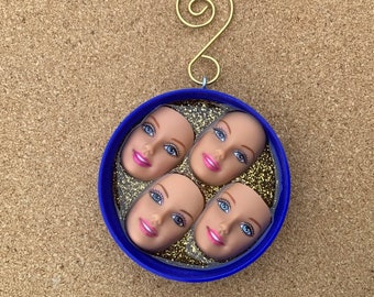 Weird upcycled doll face Christmas ornament, Blue plastic bottle cap resin